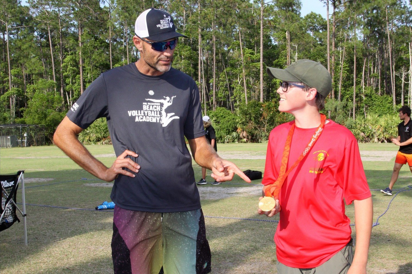 Phil Dalhausser tells David Lovett about the gold medal he won at the Beijing 2008 Summer Olympics. Dalhausser was the guest during a recent youth volleyball class presented by Volleyball1on1 in Nocatee Community Park.